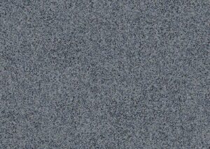 Close-up of grey and blue speckled stone or aggregate surface texture