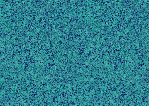 Terrazzo surface with turquoise and dark blue speckled pattern